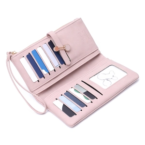 Pink faux leather long wallet for women featuring multiple card slots and wrist strap