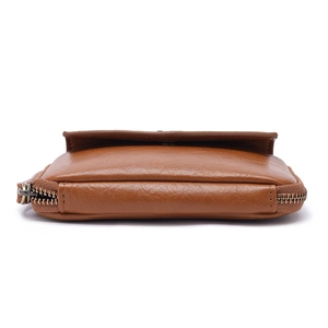 Detailed side view of brown leather passport clutch showing double zippers and stitching