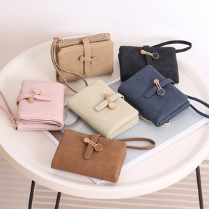 Short PU leather women's zip wallet with metal buckle and wrist strap in six colors