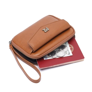 Brown leather travel passport holder wallet with wristlet and metal zipper closure