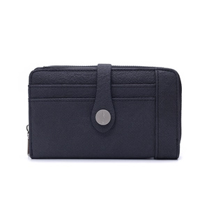 Detail view of lychee texture faux leather wallet with snap button and metal zipper closure