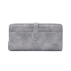 Detail of grey long wallet with woven texture, external card slots and metal zipper pull