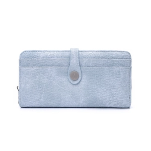 Detail of light blue long wallet with woven texture and round metal snap closure