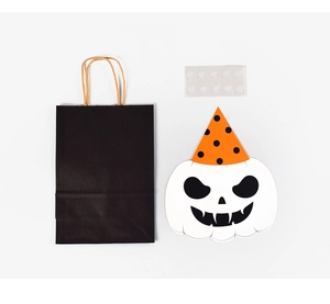 DIY Halloween gift bag set with a black paper tote, ghost card, and adhesive dots