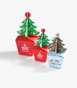 Three sizes of red and blue Christmas gift boxes with 3D folding tree toppers and Merry Christmas text