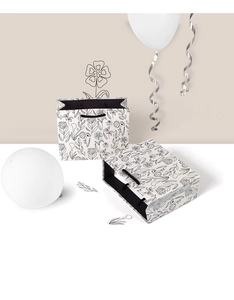 Minimalist grey square gift bag with floral line art and black woven handle details