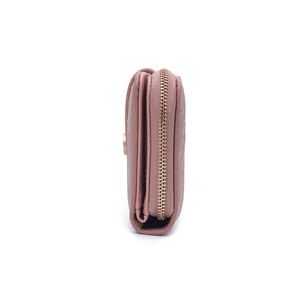 Side view of pink leather wallet featuring lychee texture and gold metal zipper detail