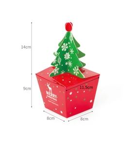 Detail view of red Christmas gift box with green 3D paper tree and white deer logo