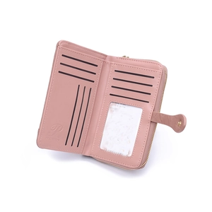 Detail of pink PU leather wallet with 11 card slots and a clear ID window display