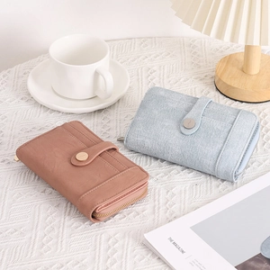 Detail shot of multi-functional PU leather folding wallets with card slots and top zippers