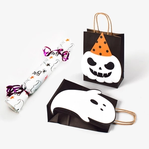 Halloween DIY gift bags with ghost and pumpkin motifs including a Boo candy wrapper tube
