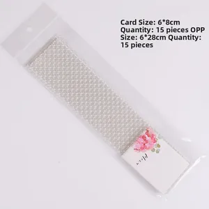 Set of 15 long OPP bags and white cards with pink floral patterns for candy packaging