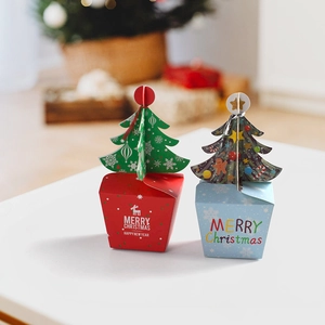 Christmas gift boxes with 3D tree toppers, reindeer prints, and festive holiday patterns