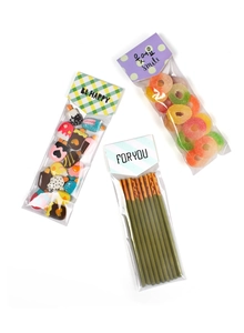 Close-up of cute snack packaging sets with colorful ice cream charms and cookies