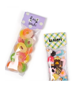 Close-up of cute cartoon candy packaging cards with colorful resin food accessories