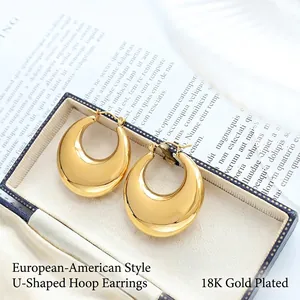Chunky U-shaped 18K gold plated hoop earrings with a high-polished mirror finish