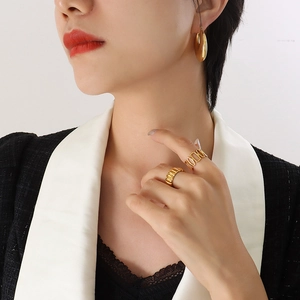 Polished 18K gold plated titanium chunky hoop earrings and geometric rings set
