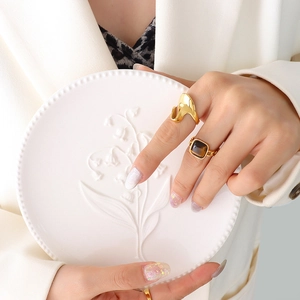 Chic gold geometric ring set with brown tiger eye stone and modern fluid line design