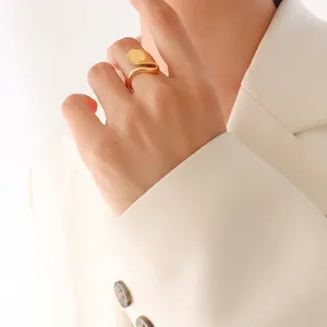 Minimalist liquid gold irregular open ring with polished circular disk for women