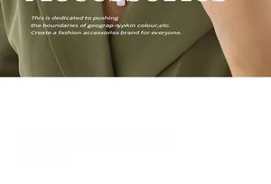 Detailed view of a minimalist white shell OT buckle pendant necklace on a green blazer