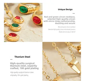 Detailed macro view of 18K gold-plated titanium necklace and ring with red and green zircons
