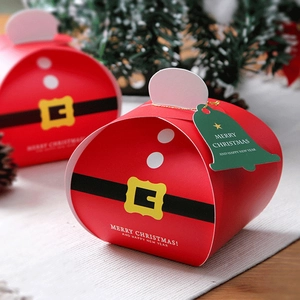 Red Santa Claus suit gift box with a green bell tag and Merry Christmas greeting