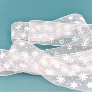 White organza snowflake ribbon for Christmas gift wrapping and festive DIY crafts
