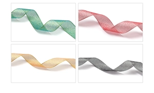 Macro detail of sheer organza gift ribbons with glittering metallic texture in four colors