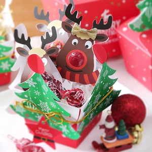 Christmas reindeer and tree lollipop decorative cards in festive red and green colors