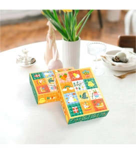 Detail view of colorful Easter surprise boxes with cartoon rabbit and chick illustrations