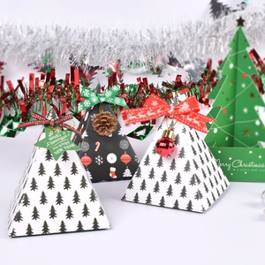 Christmas pyramid gift box set with festive tree patterns and decorative ribbon bows