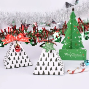 Pyramid Christmas gift box with black tree patterns, red ribbons and small bells