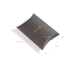Dark grey matte pillow gift box with gold merci beaucoup text and 12.5x9x2.5cm size markers
