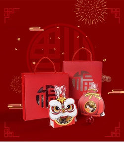 Red Chinese New Year gift boxes featuring festive lion dance and lucky Fu characters