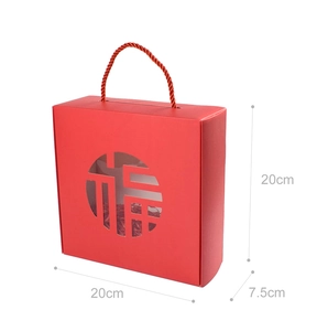 Detail view of red festive gift box with Fu character cutout and dimensions 20x20x7.5cm