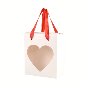 Minimalist white gift box with heart window and red silk handle for festive packaging