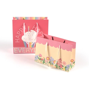 Pink border mini floral gift bags with handles for Mother's Day and celebrations