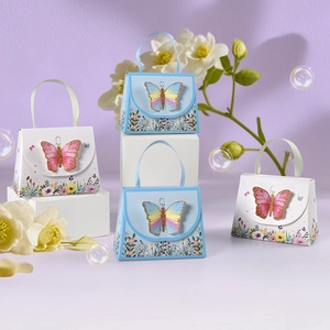 Mini butterfly floral gift boxes in blue and white with ribbon handles for weddings