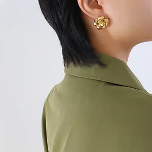 Exaggerated retro golden camellia stud earrings in polished 18K gold plated titanium steel