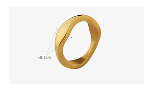 Detail view of 18k gold plated irregular wavy ring showing the 0.5cm band width