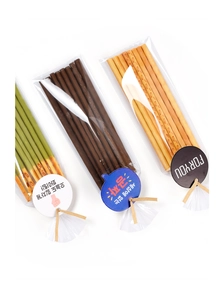 Detail of assorted biscuit sticks in OPP bags with tags and twist ties for gift packaging