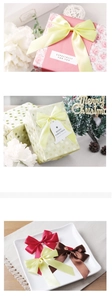 Detailansicht handgefertigter Satin-Schleifen für Geschenkboxen und DIY-Dekorationen