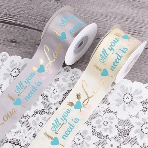 Romantic satin ribbons with Love slogans and heart prints for gift wrapping and DIY crafts