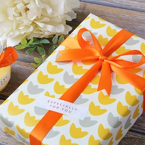 Orange polyester ribbon with tulip floral gift wrap and Especially For You label