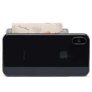 Cute cartoon bear wallet card holder attachment shown on the back of a smartphone