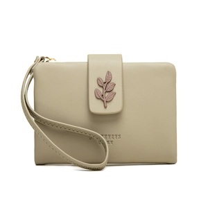 Close-up of olive green wallet featuring leaf clasp and PRETTYZYS embossed logo