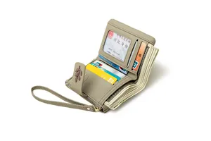 Internal view of khaki leaf buckle wallet with multiple card slots and clear ID window