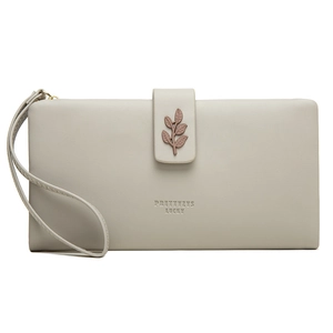 Detail of light grey pebbled leather long wallet with leaf charm and wrist strap