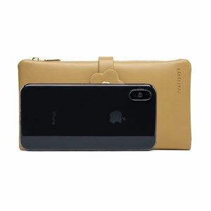 Long yellow PU leather zip wallet for women with flower clasp and iPhone for scale