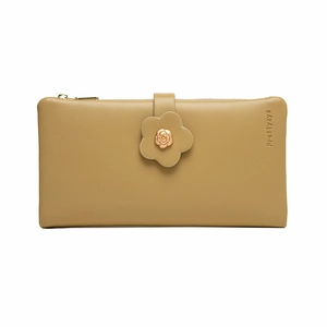 Detail of light tan PU leather long wallet featuring a floral buckle and brand embossing